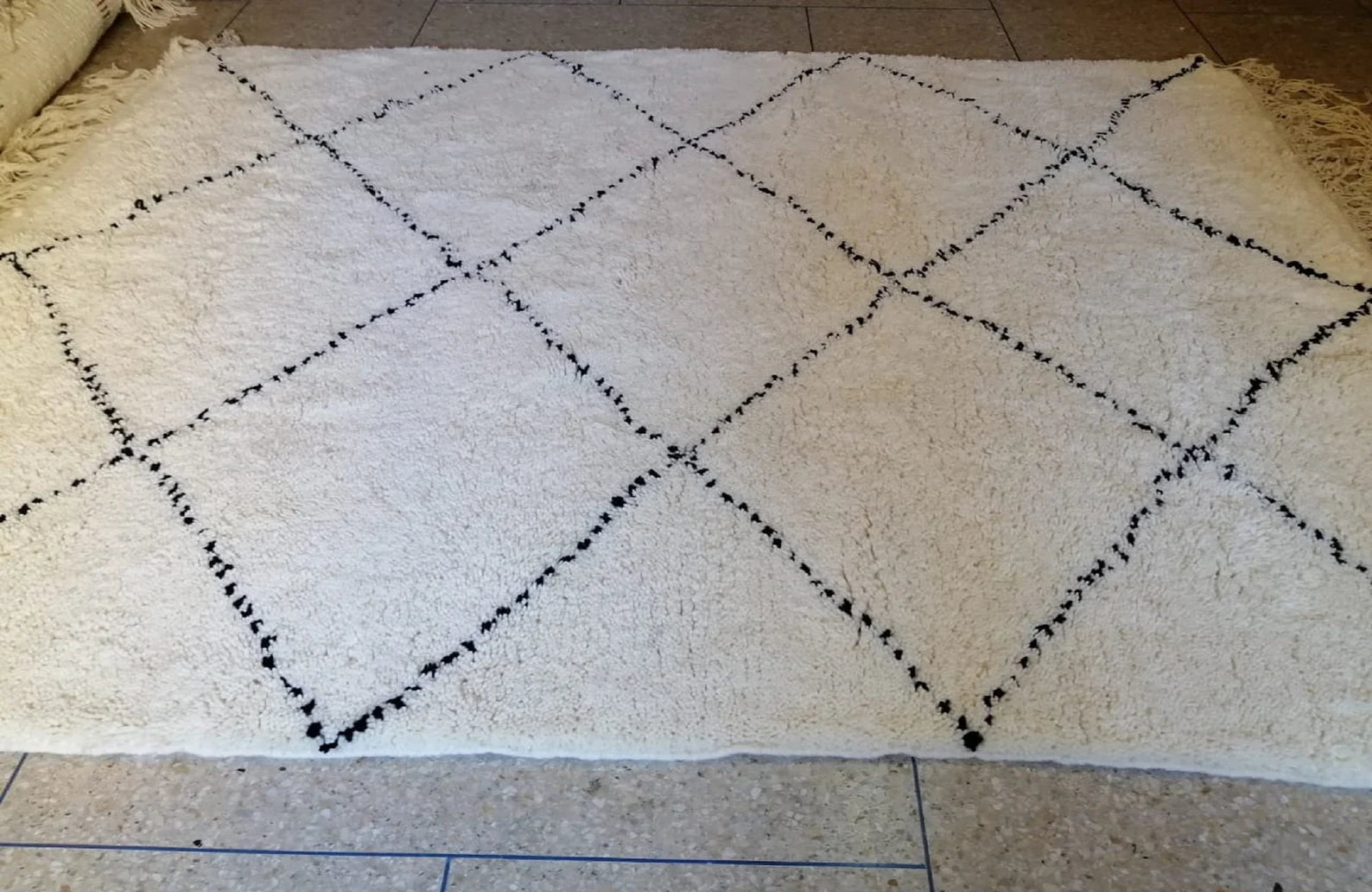 Artisan Moroccan rug designed for neutral interiors and soft luxury styling