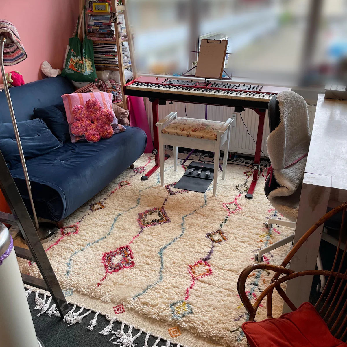 Artisan Moroccan wool rug featuring handwoven colorful diamond patterns