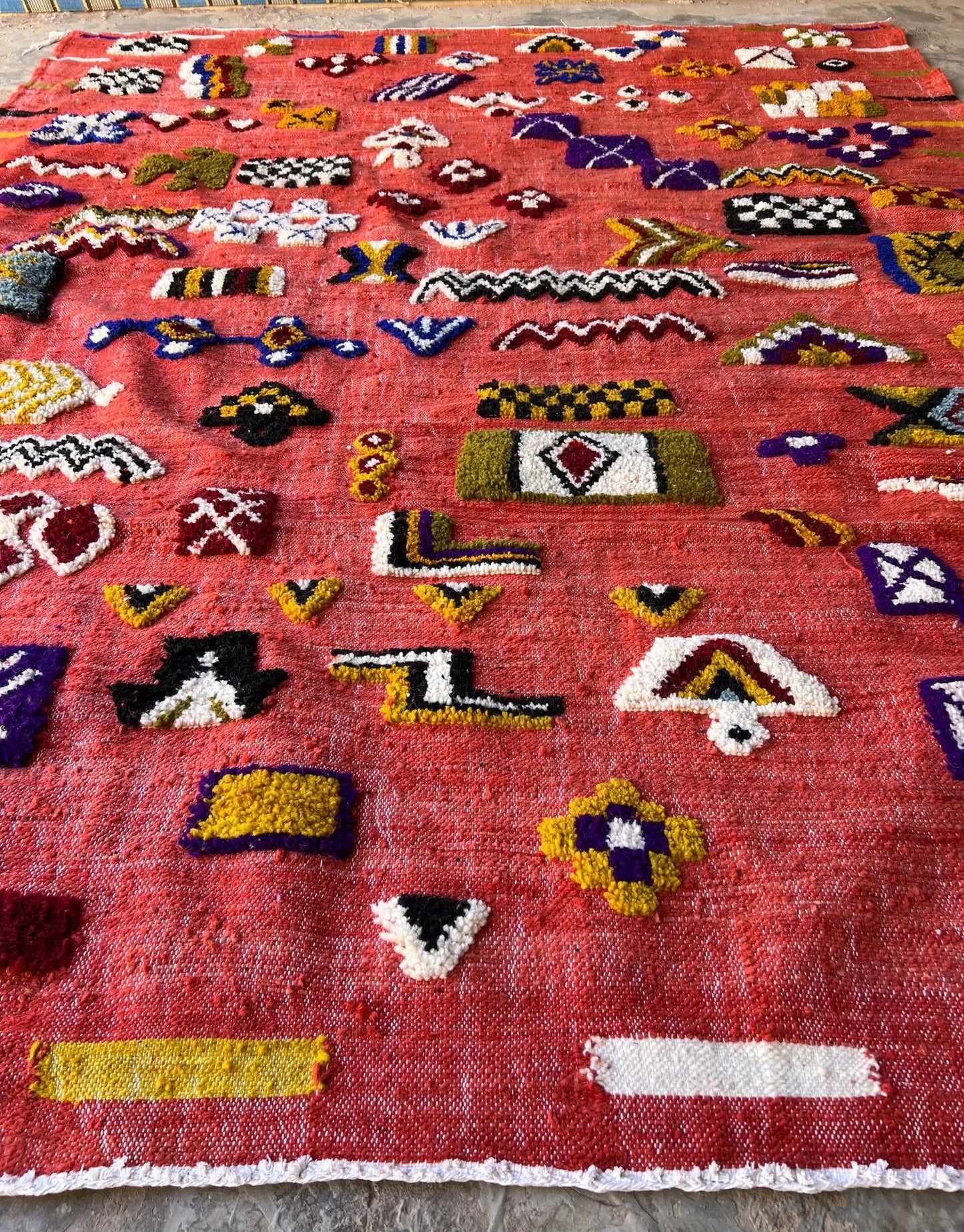 Artisan red Kilim rug adding rich color and boho character to home decor