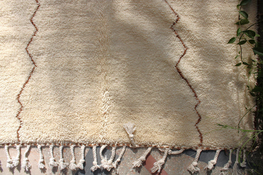 Authentic Beni Ourain Berber rug with brown zigzag pattern on ivory wool base