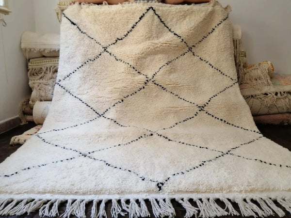 Beni Ourain Berber rug with black diamond pattern on ivory wool base