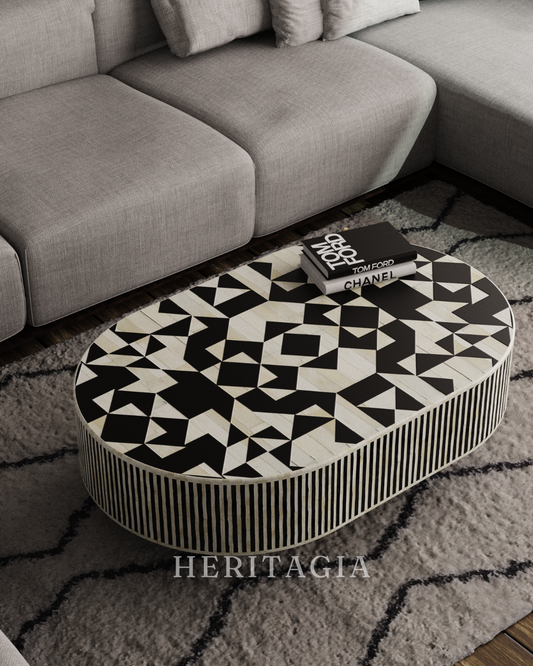 Black bone inlay coffee table with elegant gold-finished base 