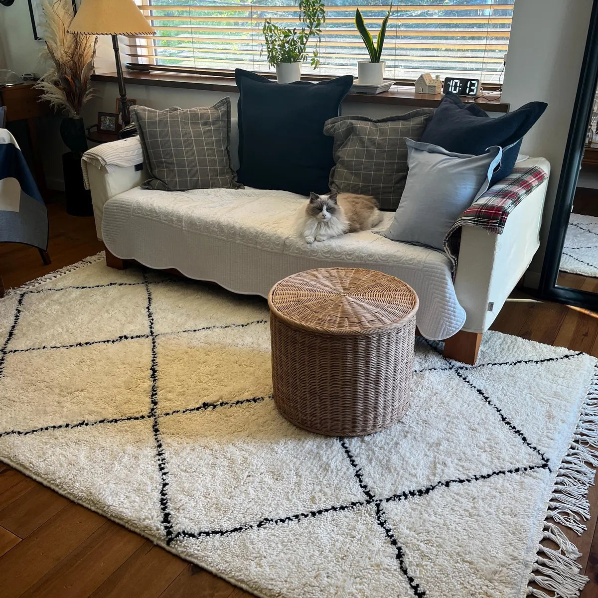 Black diamond Moroccan Berber rug handwoven on an ivory wool background