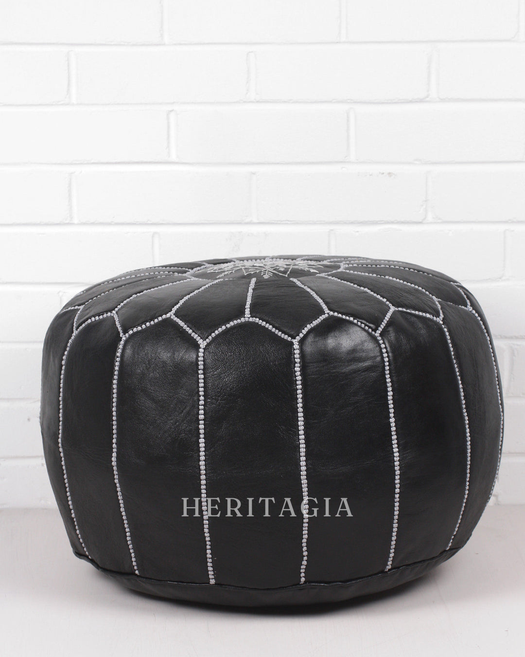 Black leather Moroccan pouf cover with concealed zip at base, sold unfilled