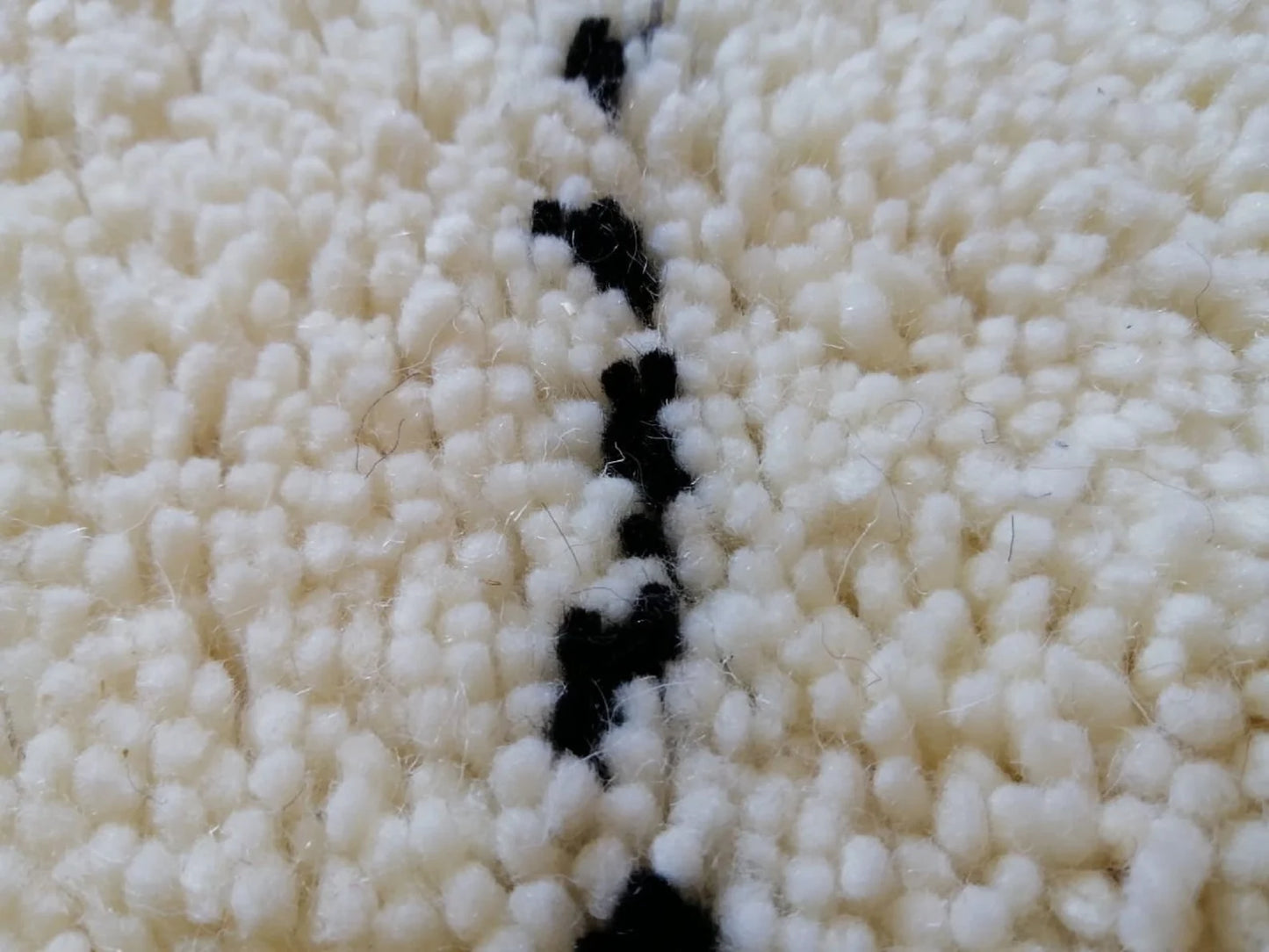 Boho ivory rug with black diamond design for relaxed home styling