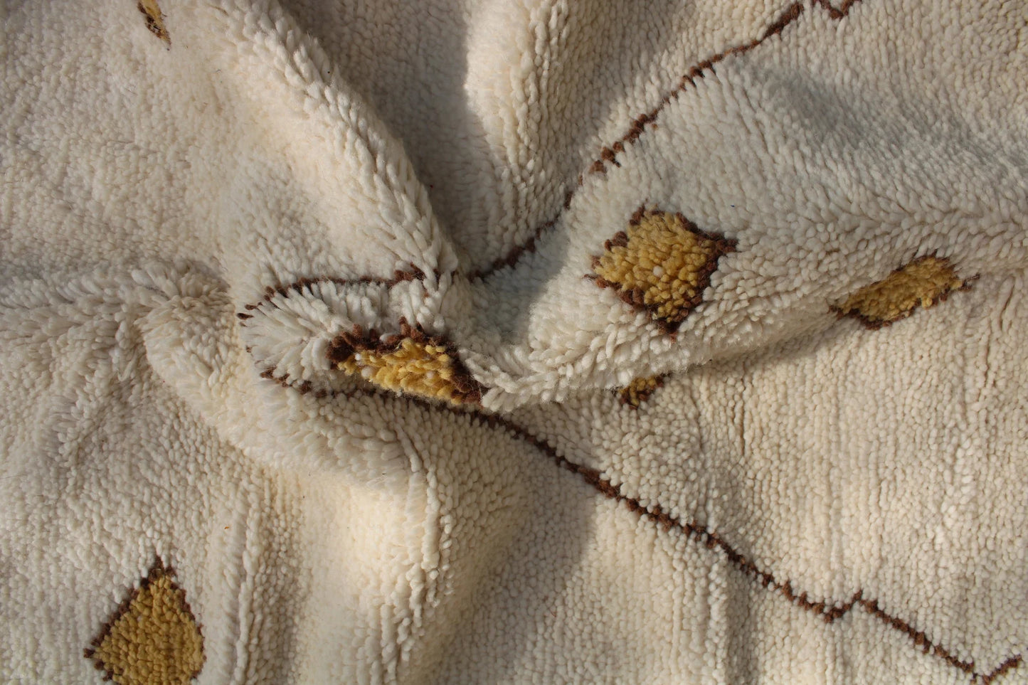 Boho ivory rug with brown zigzag design for relaxed home styling