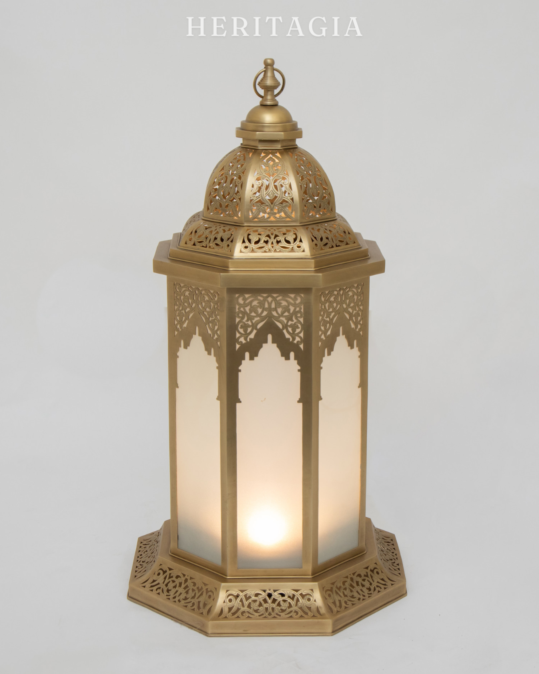 Frosted glass floor lantern in antique brass finish for elegant interiors