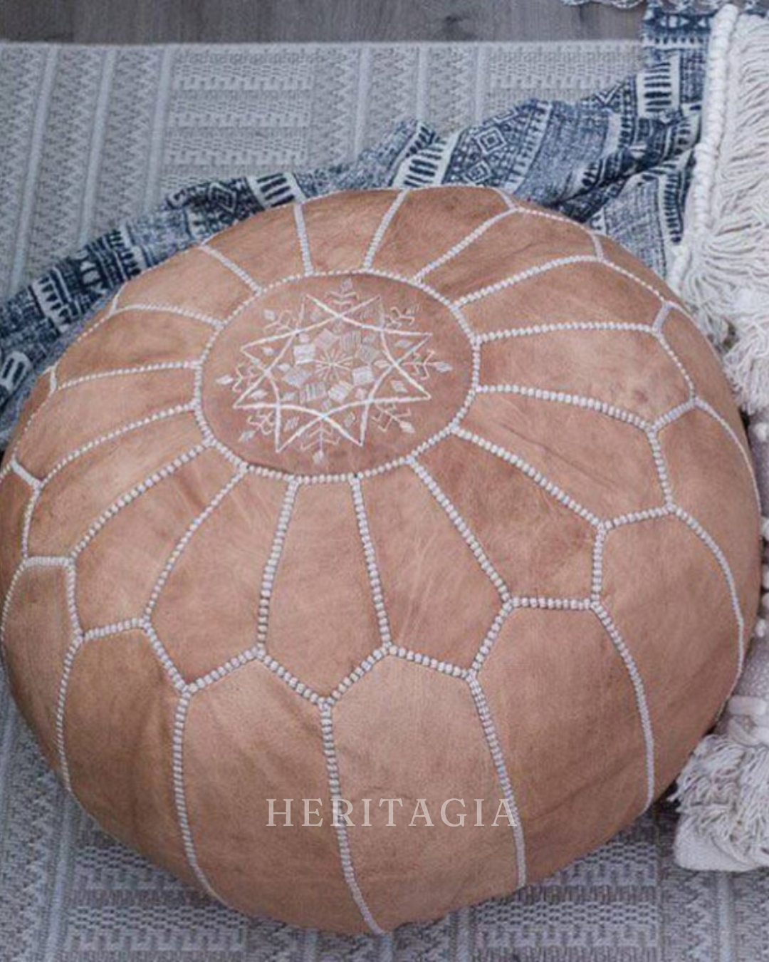 Full grain lambskin leather pouf in natural tan with hand stitched detail 