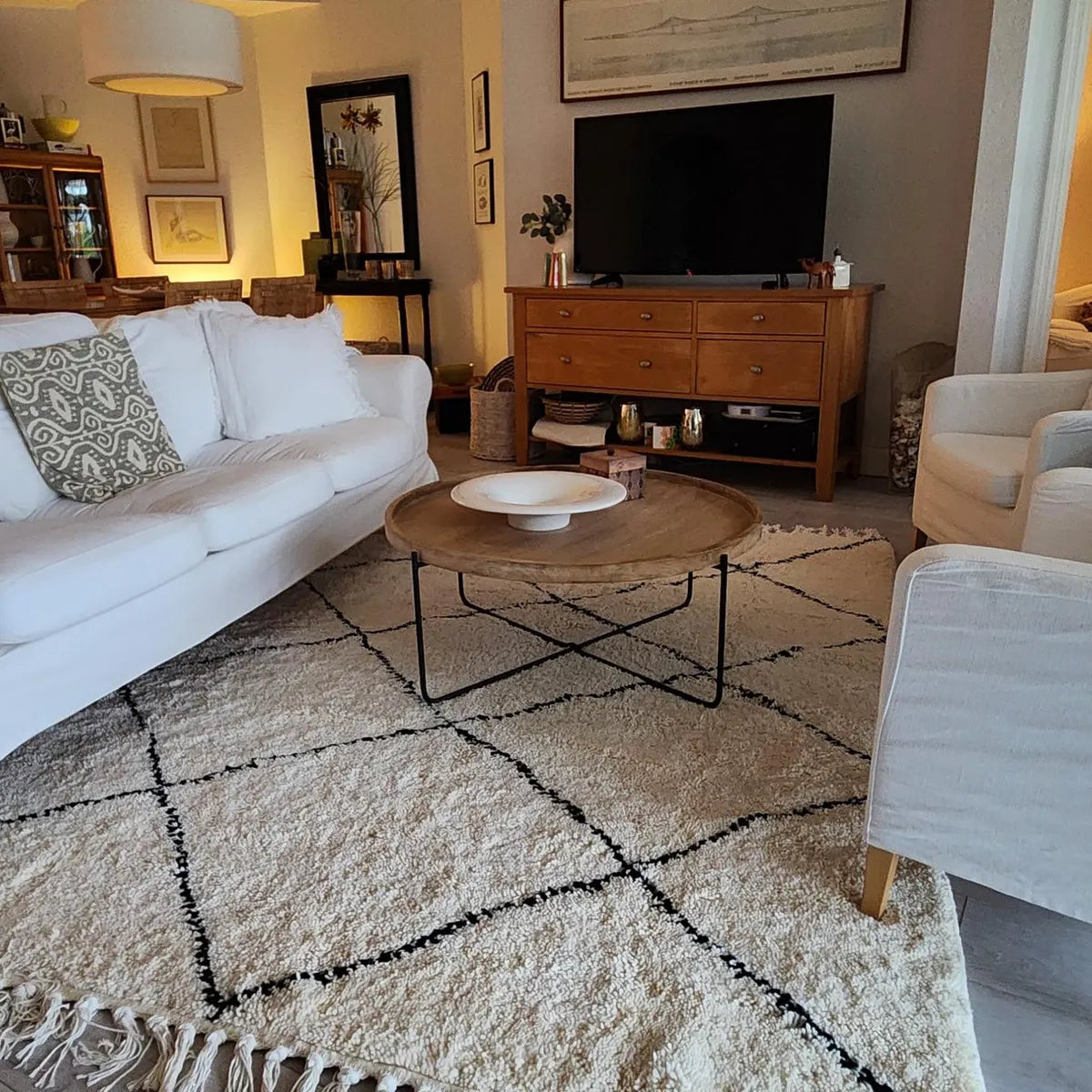Handmade ivory Moroccan wool rug with soft plush texture and artisan detail