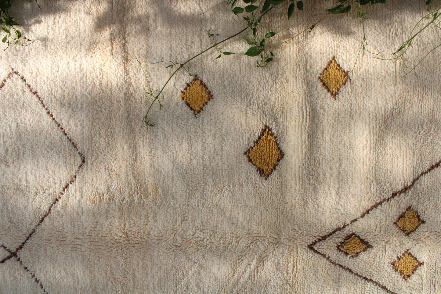 Large Beni Ourain rug styled for cozy living room and bedroom decor
