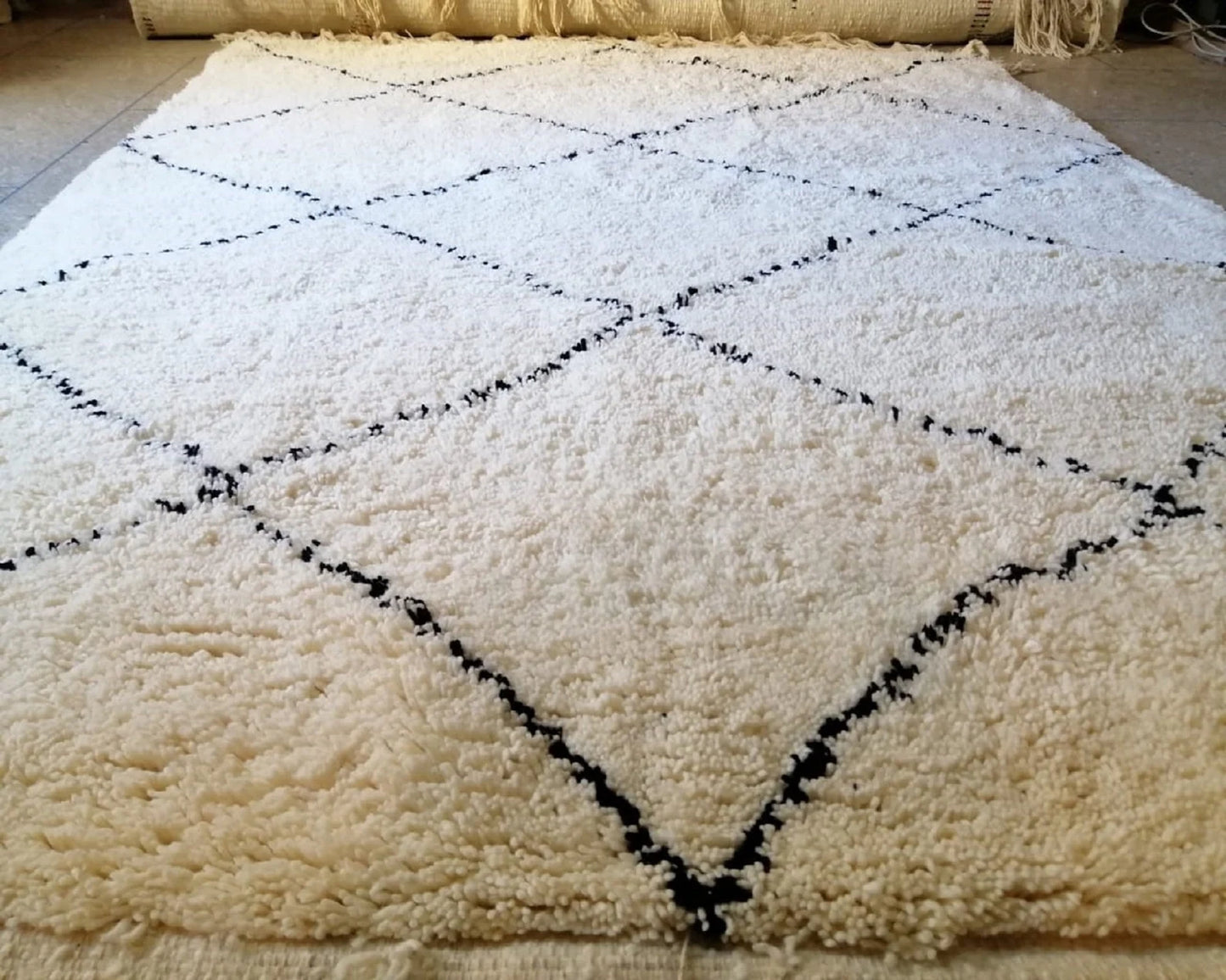Luxury handmade Berber rug adding warmth and texture to bedroom decor