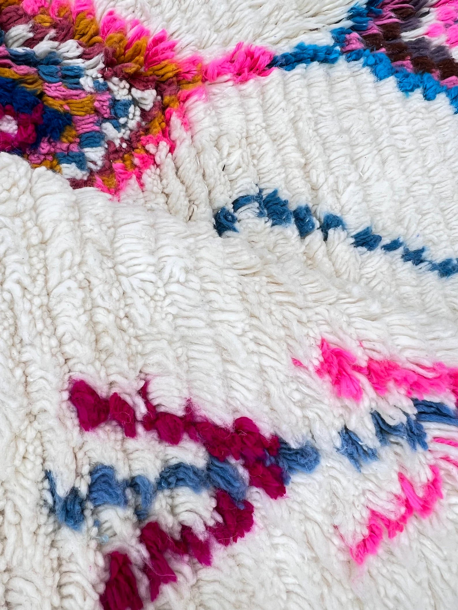 Luxury handmade Moroccan wool rug with vibrant diamond motifs