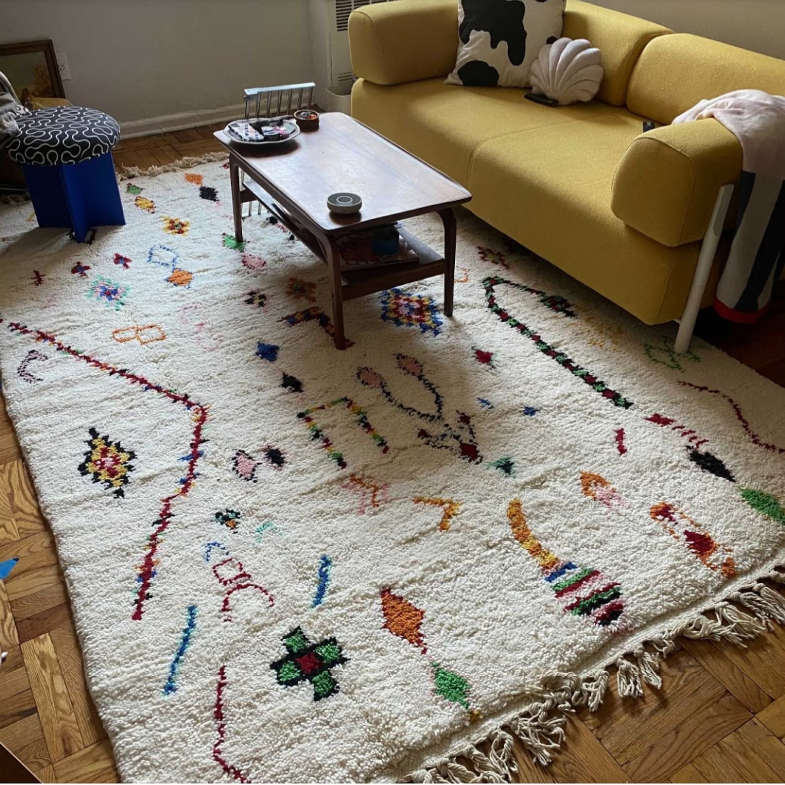 Luxury handmade rug bringing color softness and texture to bedroom decor