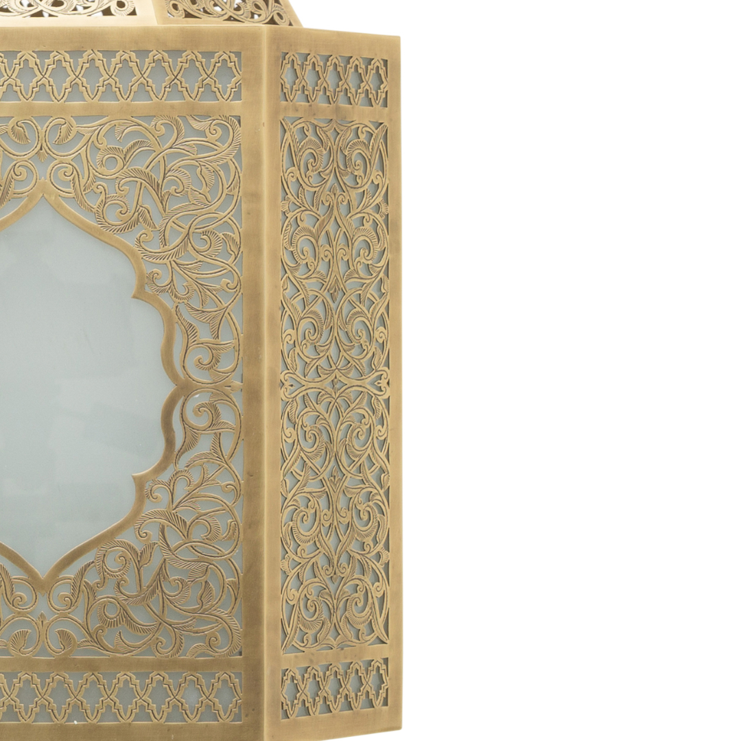 Moroccan lantern with glass panels and ornate brass finish for home interiors