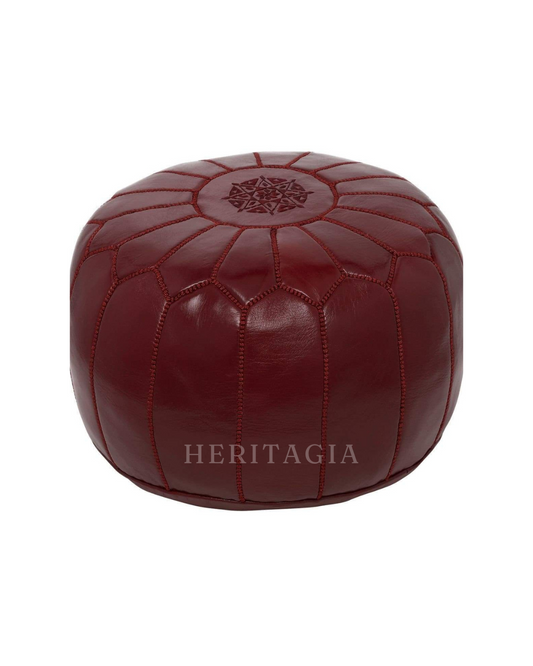 Moroccan Leather Pouf in deep burgundy leather with hand stitched artisan detail 