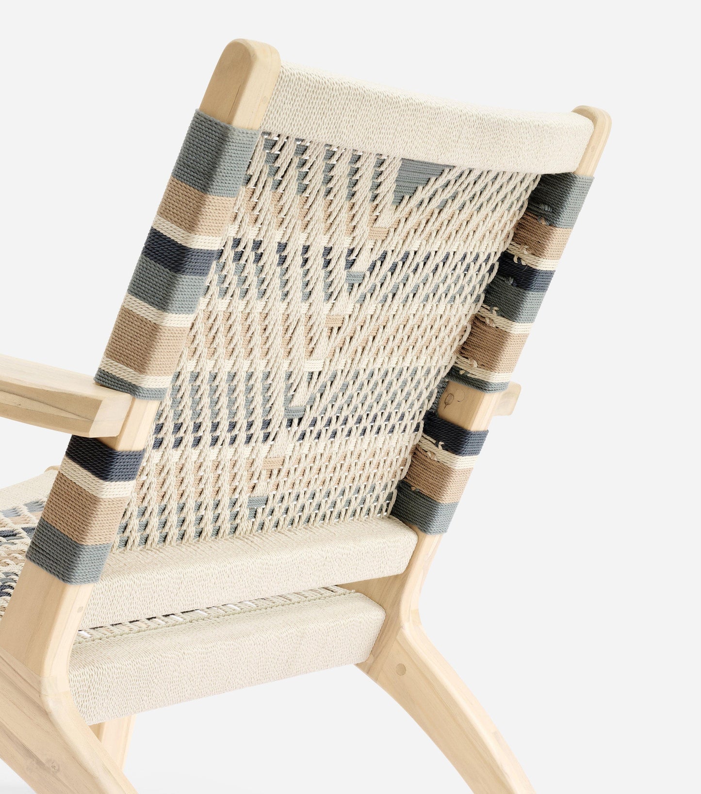 Natural wood armchair with neutral woven detail and sculptural arms 