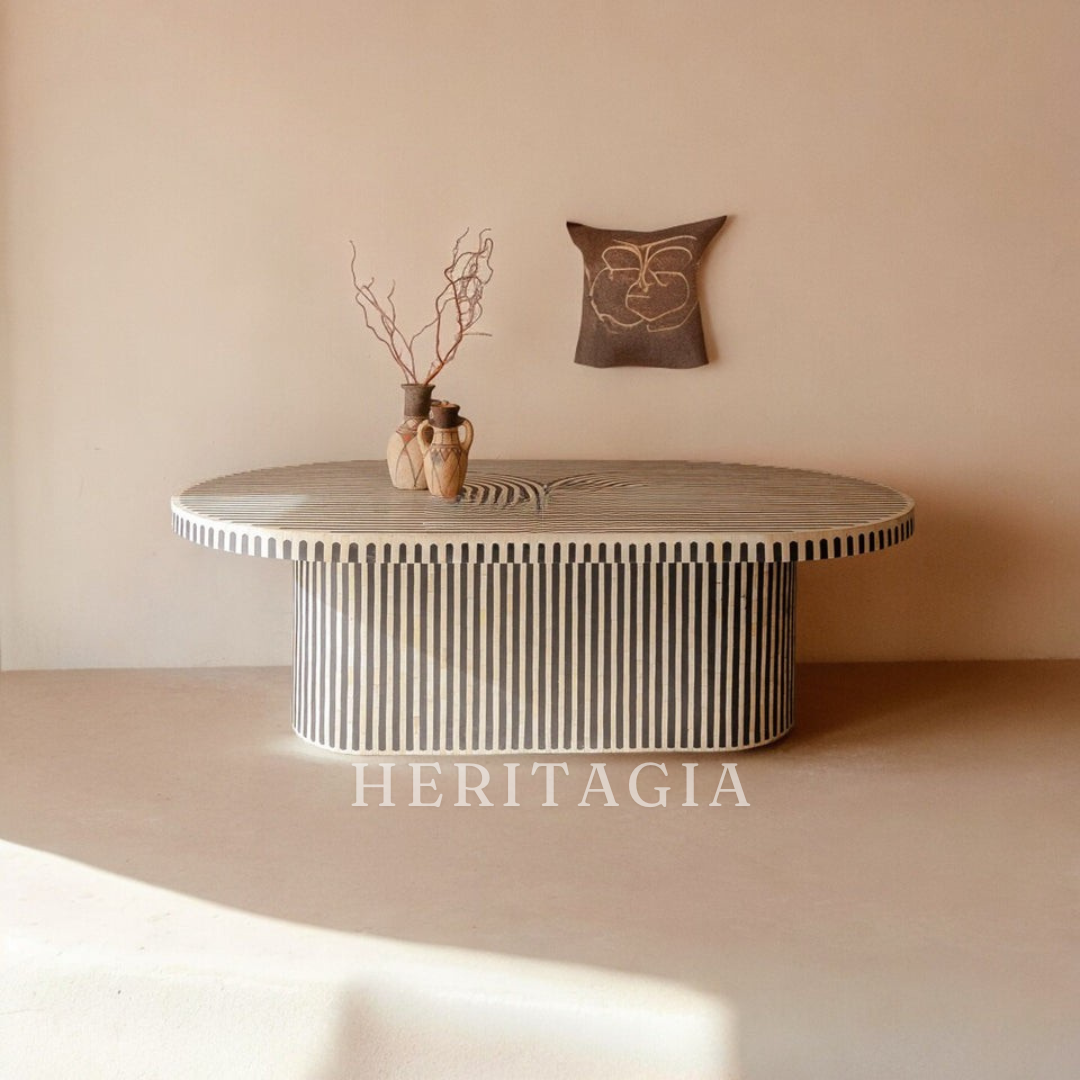 Oval bone inlay dining table with concentric stripe pattern