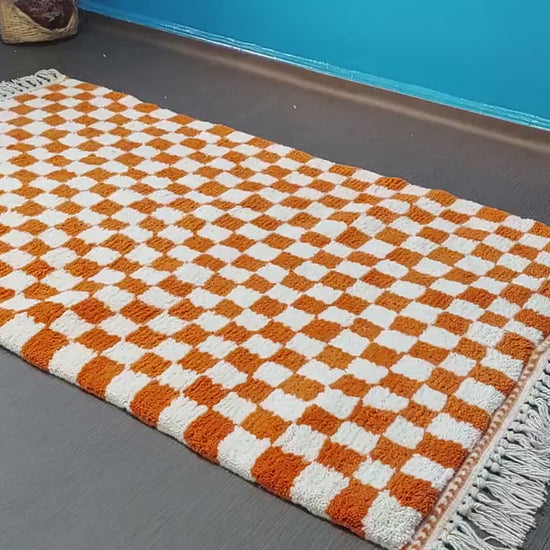 Vintage Berber checkerboard area rug featuring thick handwoven wool texture