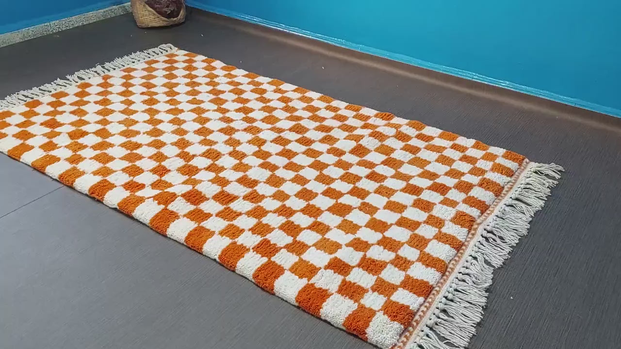 Vintage Berber checkerboard area rug featuring thick handwoven wool texture