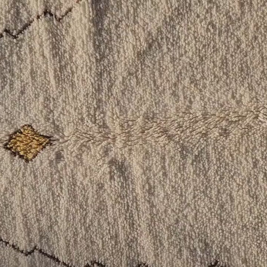 Luxury handmade Berber rug adding warmth and texture to bedroom decor