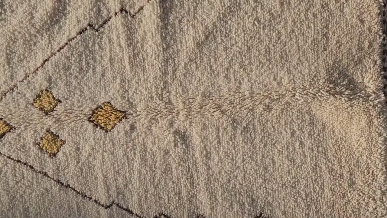 Luxury handmade Berber rug adding warmth and texture to bedroom decor