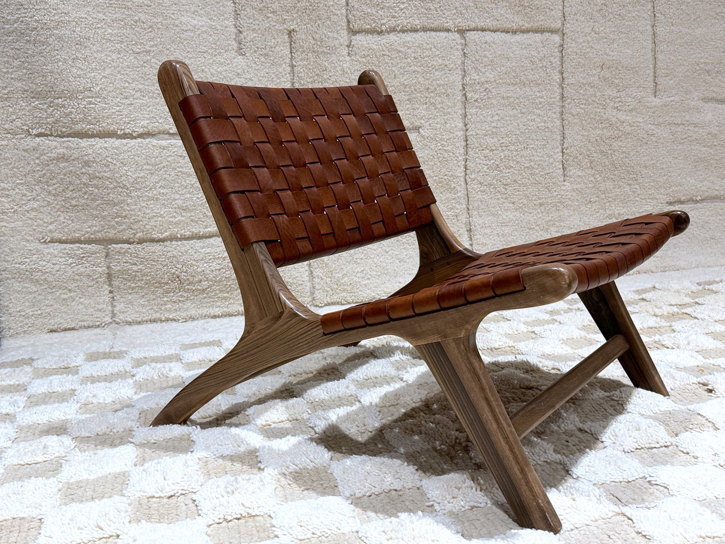 Rustic woven leather chair with solid wood frame