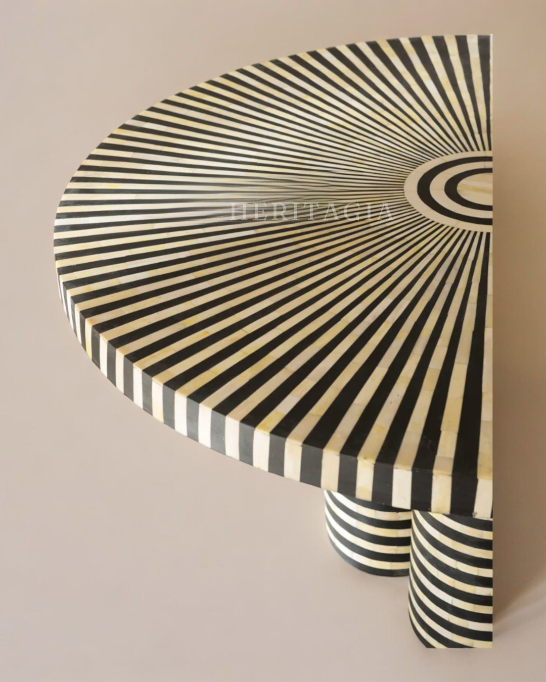 Striped bone inlay dining table with sculptural round form
