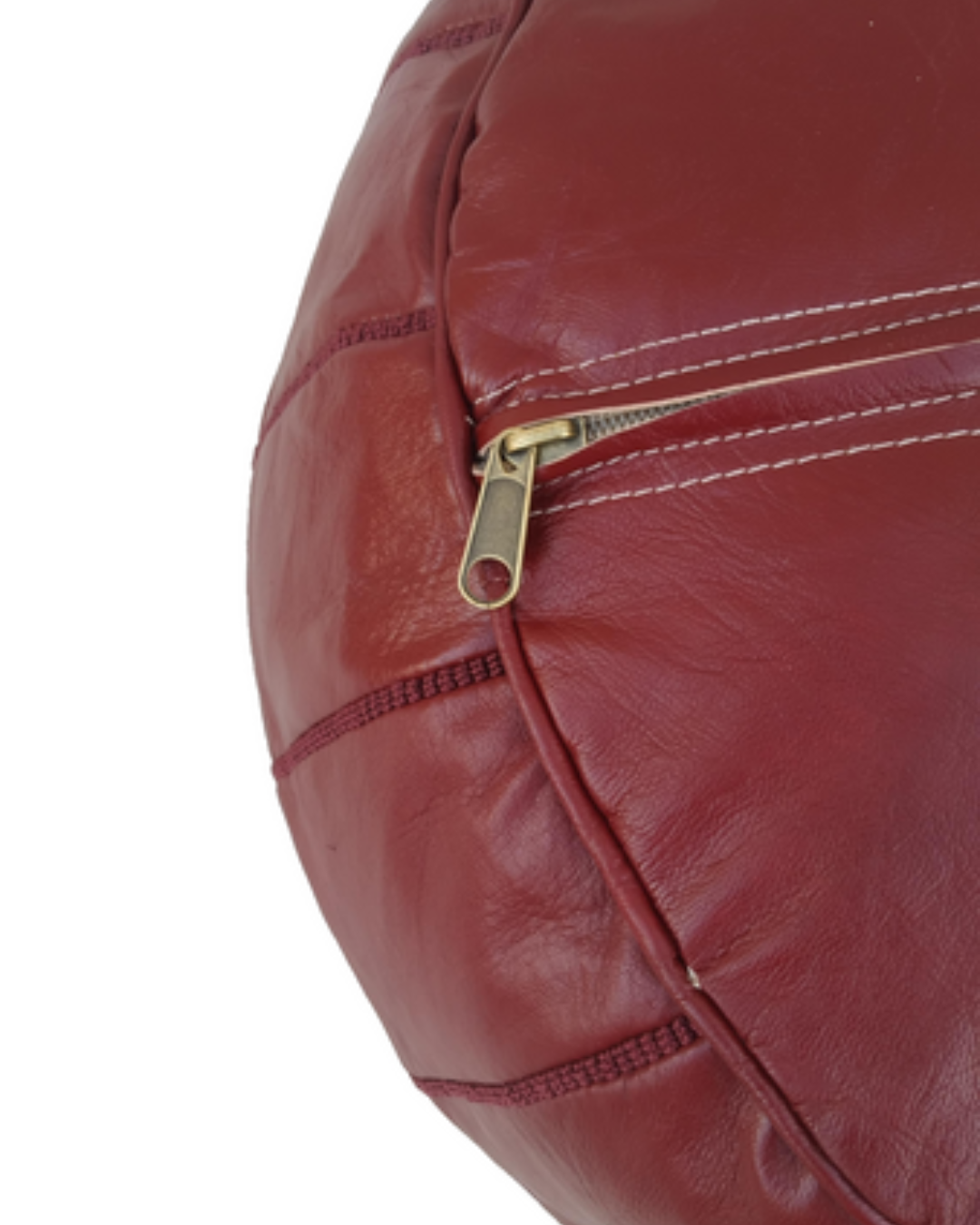 Stuffed burgundy leather pouf filled with firm recycled cotton batting