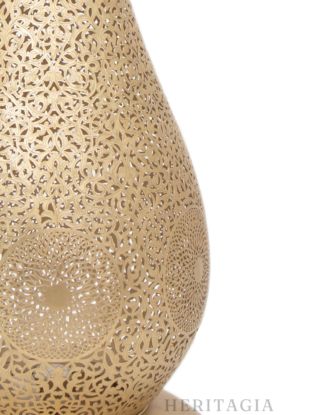Tall brass statement floor lamp with elegant handcrafted pattern