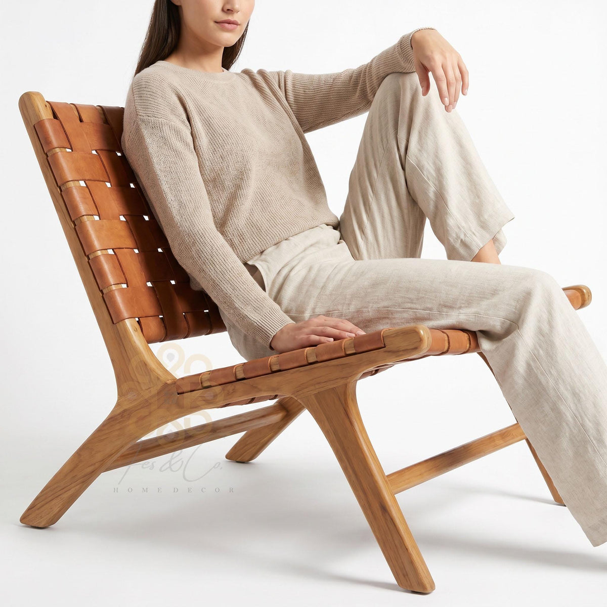 Saddle Cognac Chair — Profile view; supporting photography shown in cognac leather