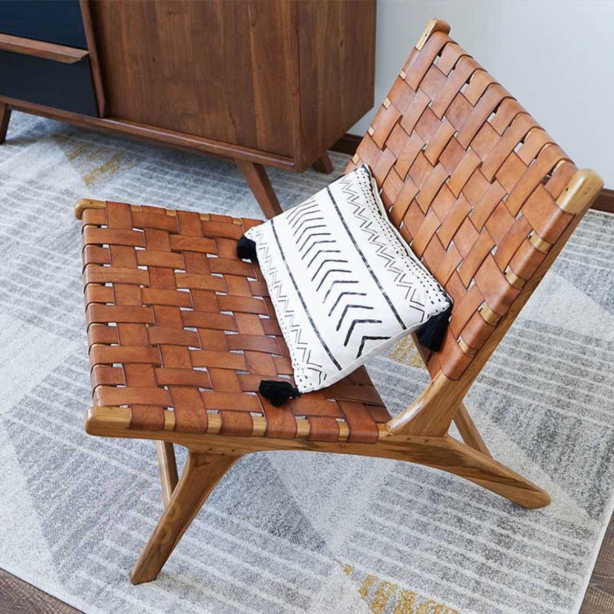 Saddle Cognac Chair — Three-quarter angle; supporting photography shown in cognac leather