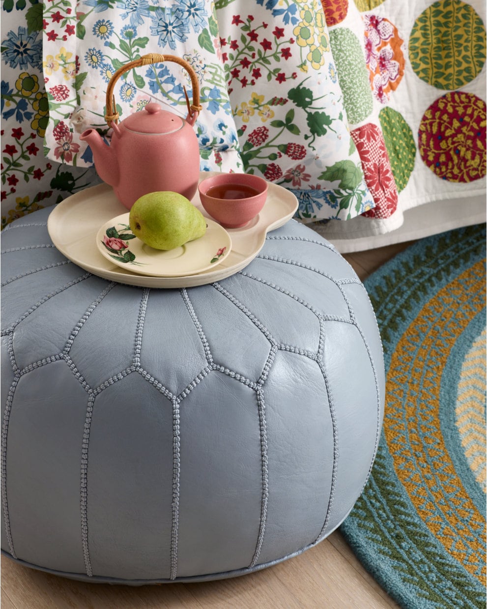 Shared view — blue pouf styled with tea tray; example colour and filled styling